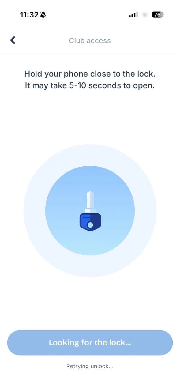 The Club access screen in a club's branded app, telling the customer to hold their phone close to the lock while it searches for it.